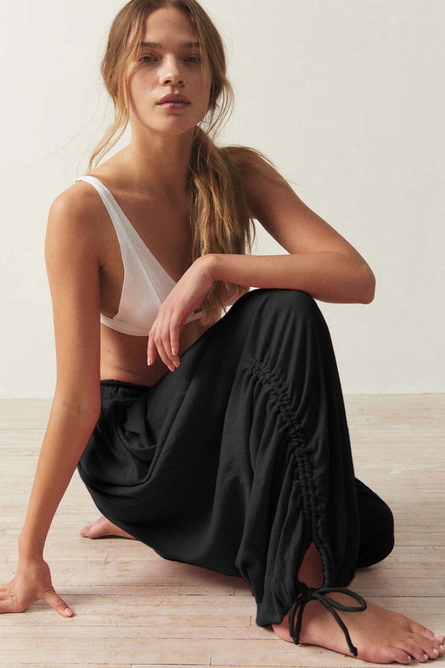 Gathered ankle-tie balloon trousers in Black