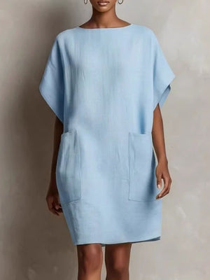 shift dress in light blue featuring pocketed and relaxed fit