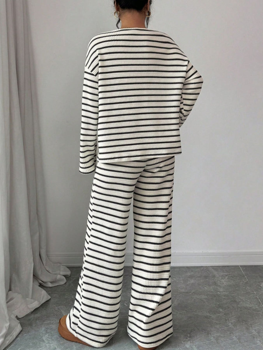 100% polyester Care instructions: Machine wash cold Top and Pants Set in White with relaxed silhouette
