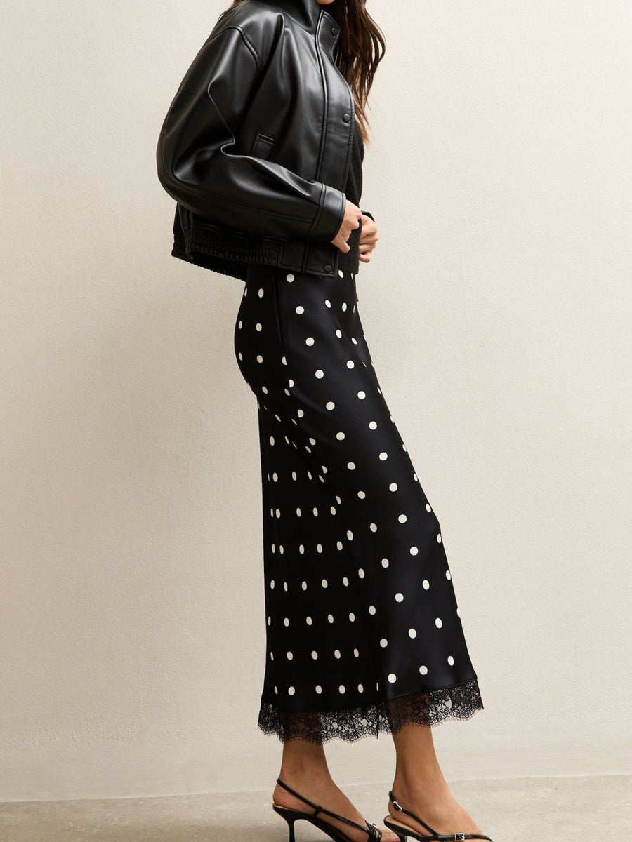 midi skirt featuring polka dot in black with 100% polyester Care instructions: Machine wash cold texture