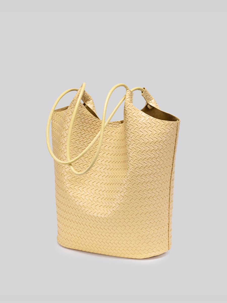 tote in pale yellow with woven texture and woven texture