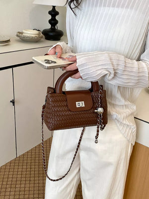 Brown crossbody bag with mini and clasp