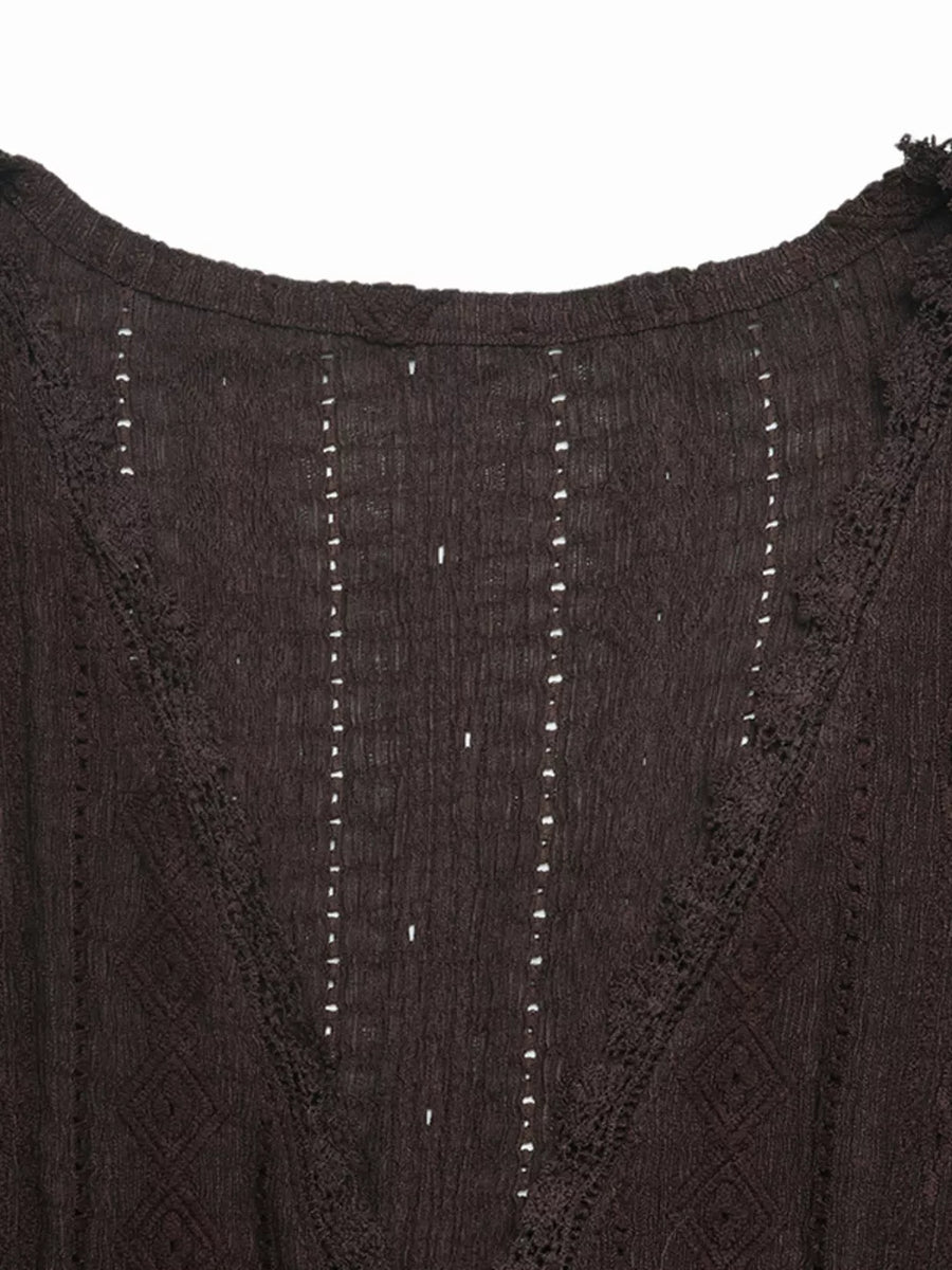Brown lace-trimmed ruffled V-neck maternity shirt with eyelet detail.