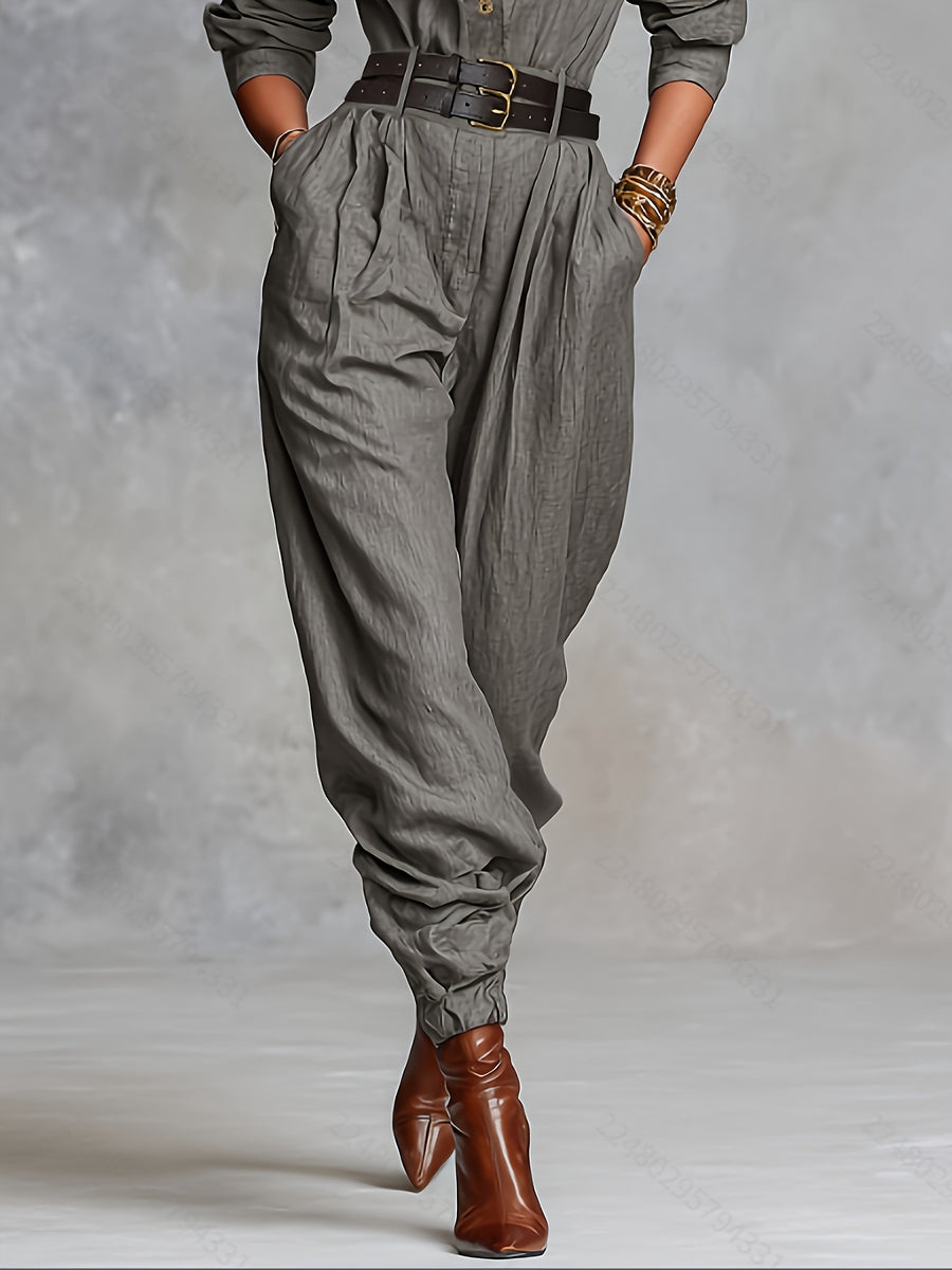 80% polyester, 20% linen Care instructions: Machine wash cold jumpsuit in olive green with relaxed silhouette