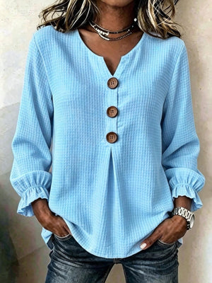 Black blouse with hip-length and half-button