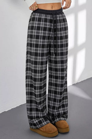 wide-leg pants featuring plaid in Black with 97% polyester, 3% elastane Care instructions: Machine wash cold texture