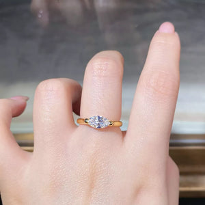 ring in gold featuring marquise-cut diamond and fitted fit