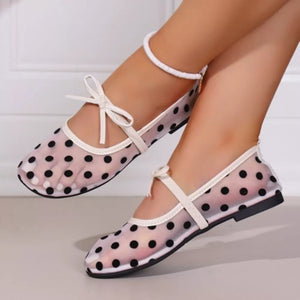 black flats with polka dot and not applicable