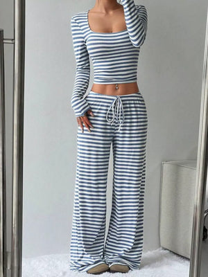 Sky blue and white striped crop top and wide-leg pants with drawstring waist.