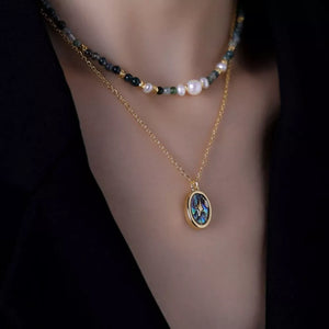 necklace in gold featuring layered design and layered fit