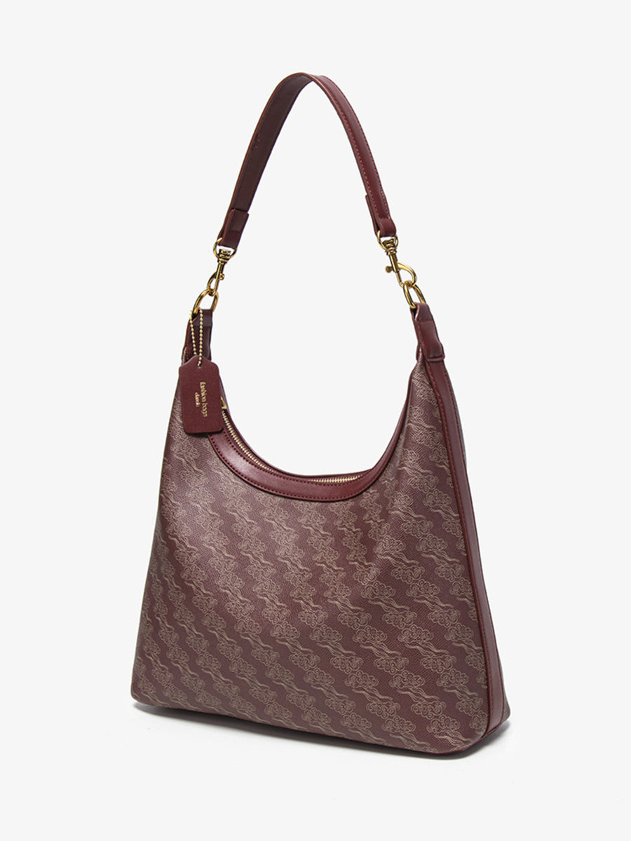 Wine Red handbag featuring adjustable strap and geometric