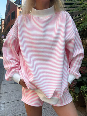 95% viscose, 5% elastane Care instructions: Machine wash cold sweatshirt in Blush Pink with relaxed silhouette
