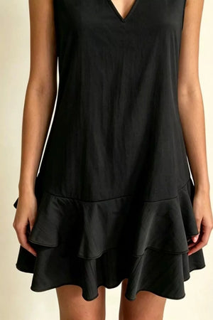Black V-neck mini dress with tiered ruffle hem in polyester