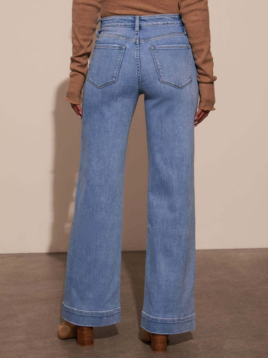 Sailor-inspired wide leg jeans in light wash denim with a flared hem.