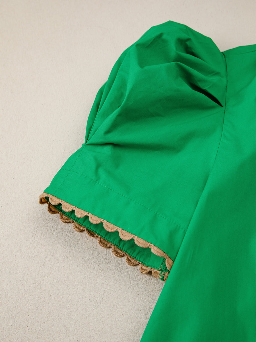 Green cotton blouse with puff sleeves and ricrac trim detail