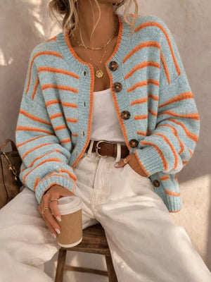 95% polyester, 5% elastane Care instructions: Machine wash cold cardigan in Light Blue with relaxed silhouette