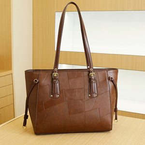 tote in Brown with patchwork and gold logo charm