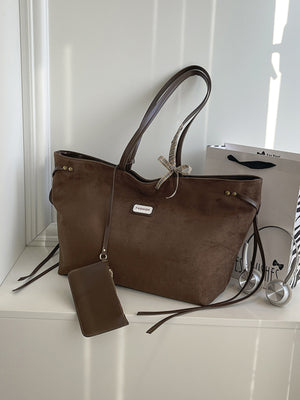 tote in dark brown featuring long shoulder straps and boxy fit