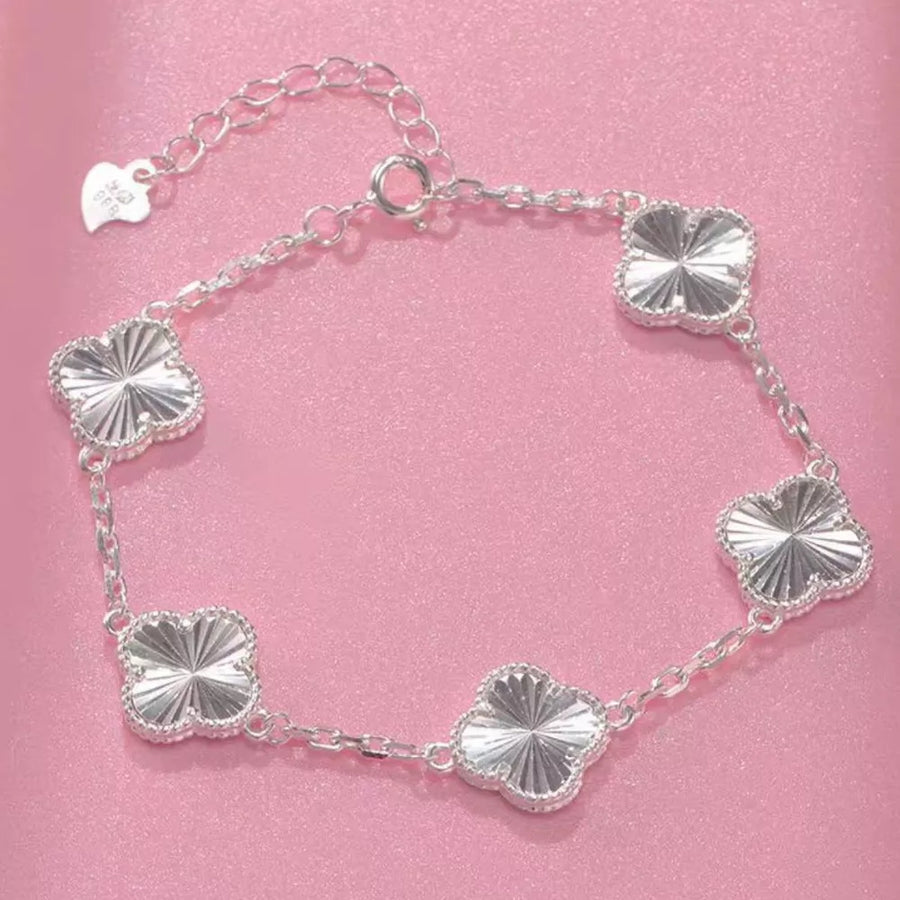 bracelet in silver with four-leaf clover and four-leaf clover charms
