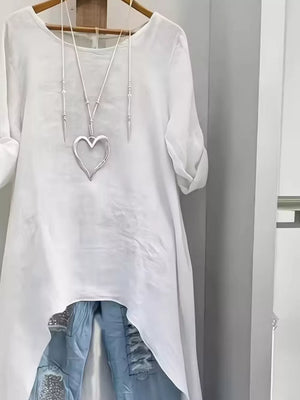 White blouse with roll-tab sleeves and rolled sleeve