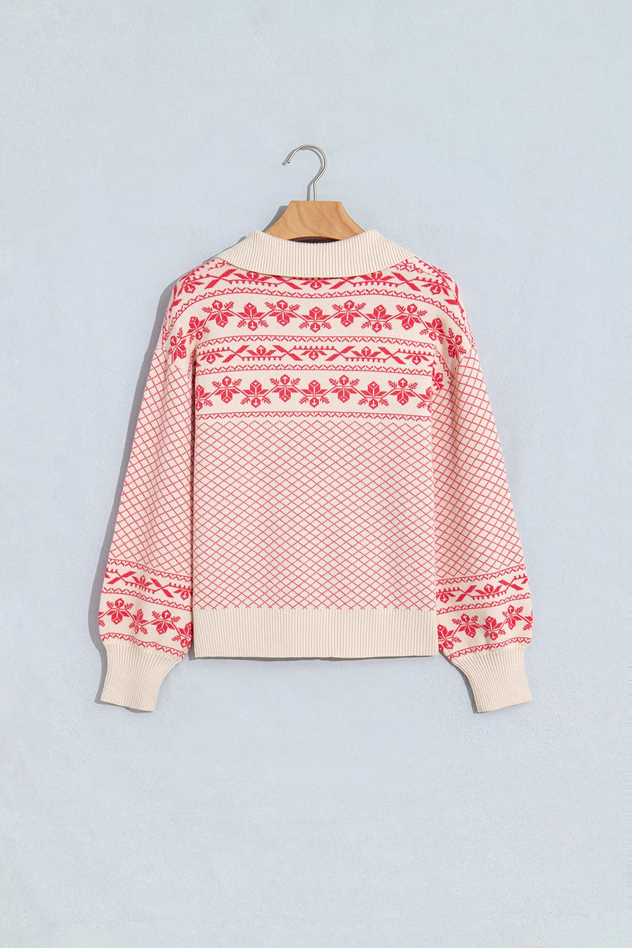 ivory pullover sweater with waist-length and half-button