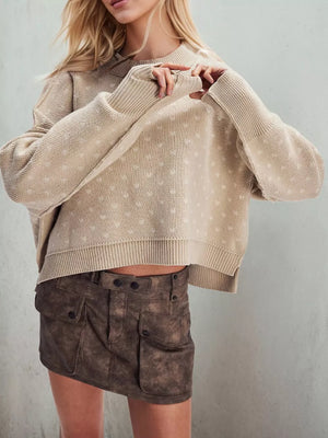 Khaki pullover sweater featuring ribbed and textured knit