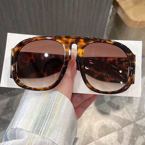 sunglasses in dark gray with ombre and UV400 protection