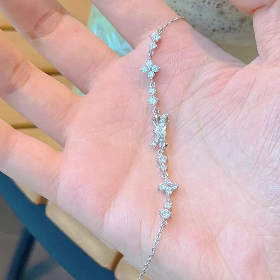 silver with bracelet with bow detail 9