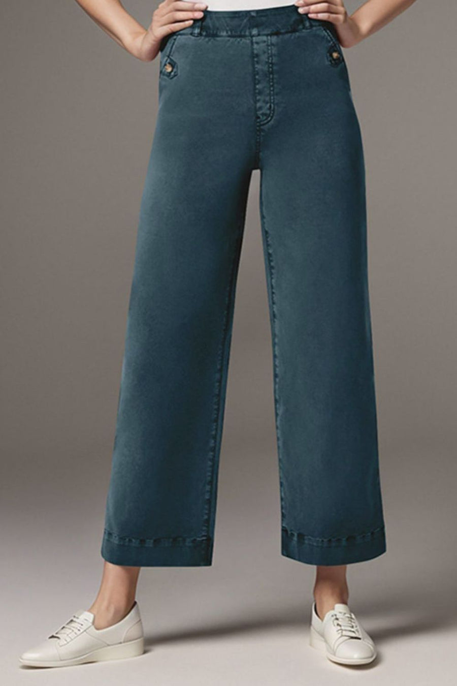 Wide-leg denim trousers in French Blue with button details and a cropped length.