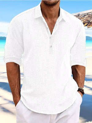 White relaxed fit half-button casual shirt with rolled sleeves.
