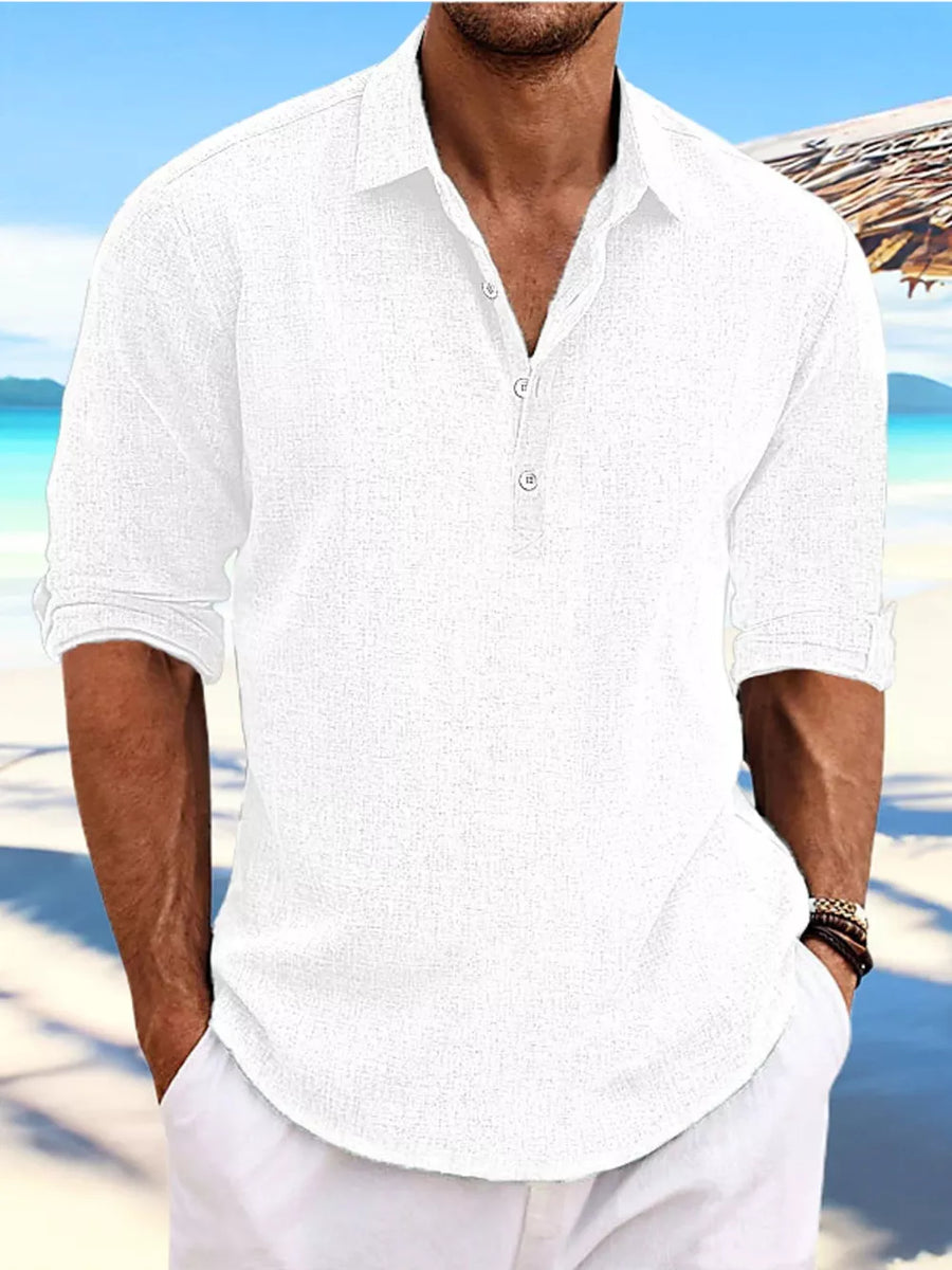 White relaxed fit half-button casual shirt with rolled sleeves.