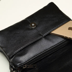 crossbody bag featuring crocodile-print in black with PU Leather Imported Size & texture