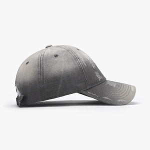Gray distressed cotton baseball cap with frayed details