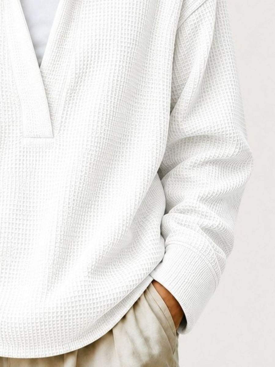 100% polyester Care instructions: Machine wash cold sweatshirt in Black with relaxed silhouette