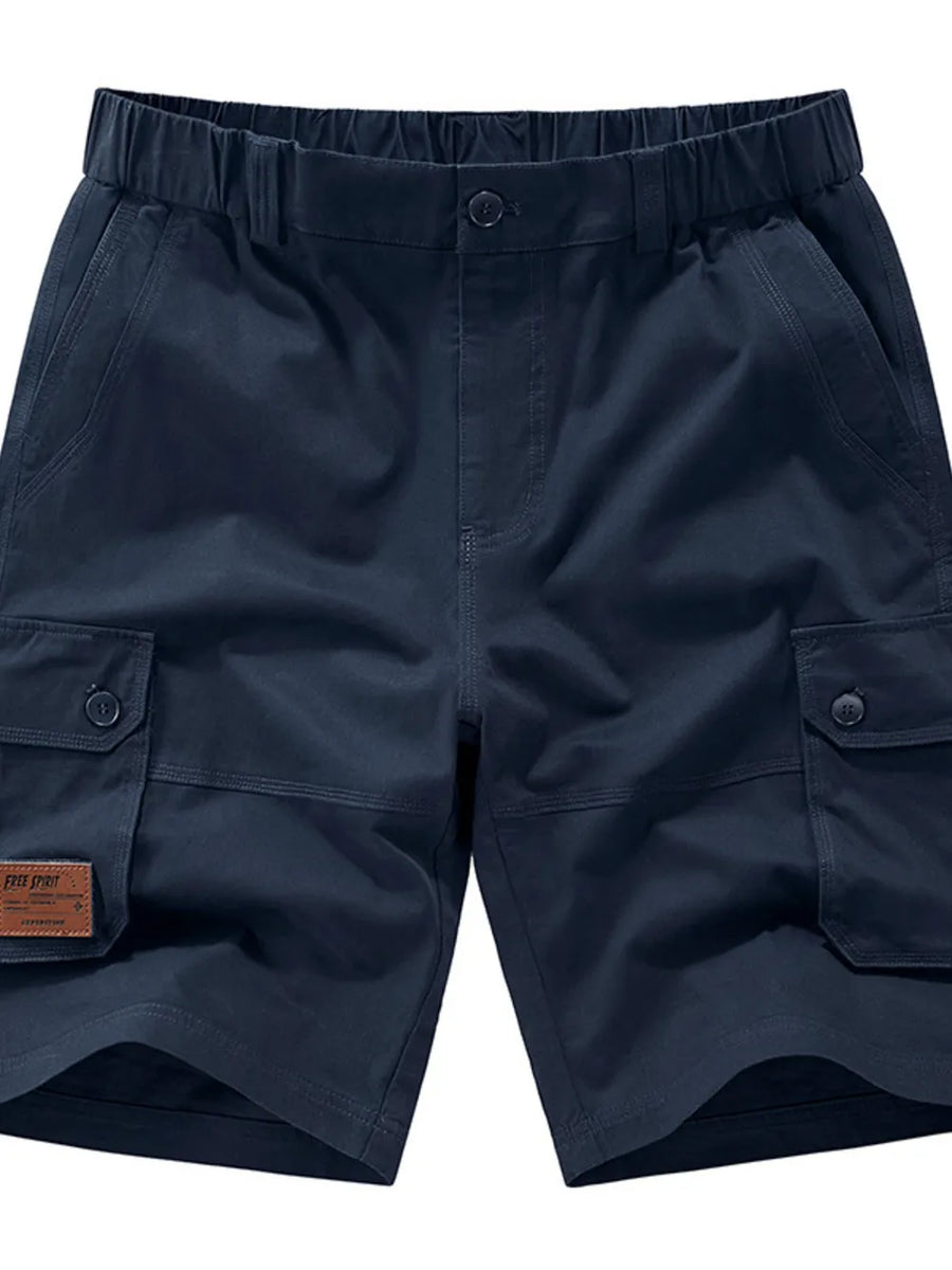 Royal blue chino shorts with elastic waist, button fly, and cargo pockets.