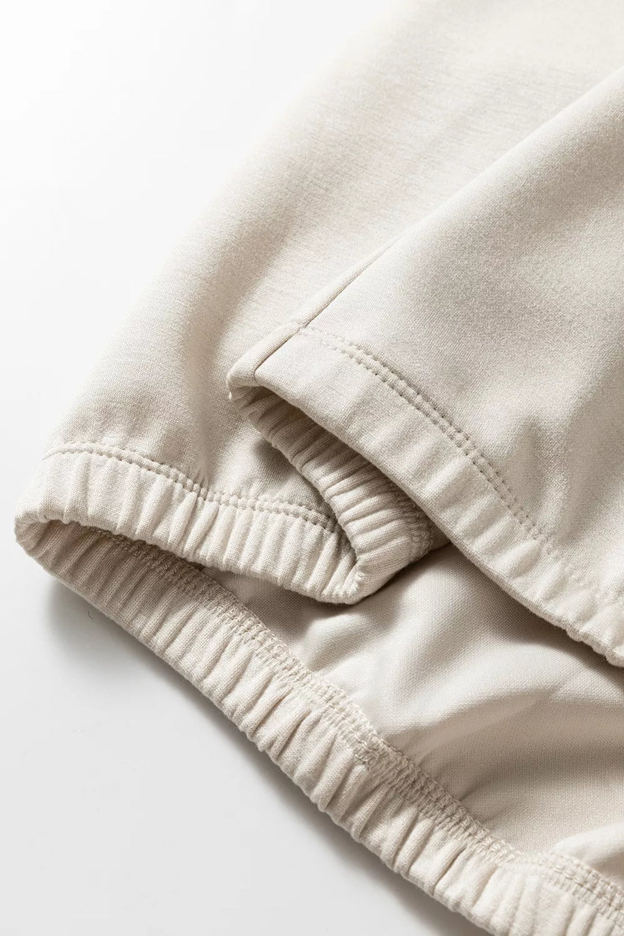 light beige pullover hoodie with stretch and long sleeve