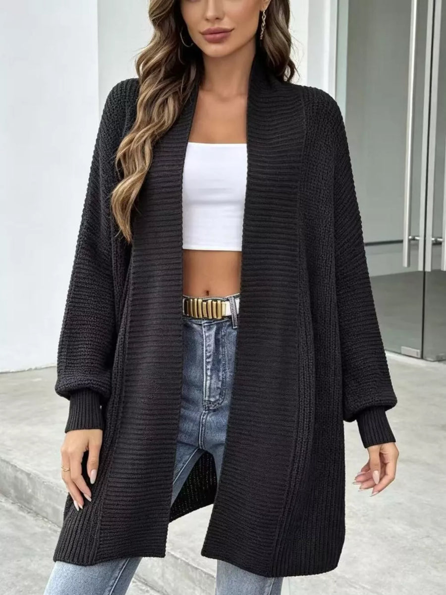 100% polyester Care instructions: Machine wash cold cardigan in Ivory with relaxed silhouette