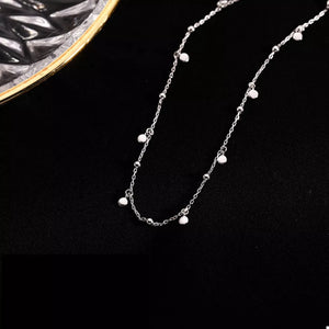 necklace in Silver with disc charms and choker