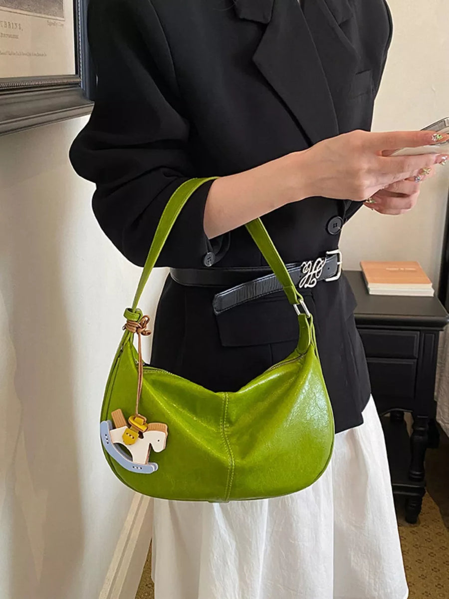 shoulder bag in lime green featuring shoulder strap and relaxed fit