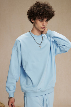 Light blue crewneck sweatshirt with long sleeves