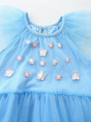 Blue tulle baby dress with cap sleeves and floral embroidery detail.