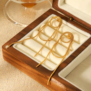 earrings in gold featuring gold-plated and dangling fit