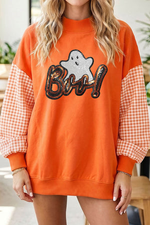 white sweatshirt featuring sequin embellishment and gingham, sequin