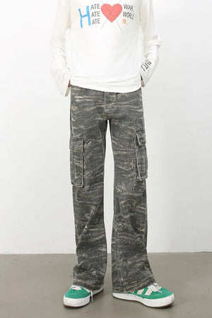Distressed camo wide-leg cargo jeans in dark gray with multiple pockets.