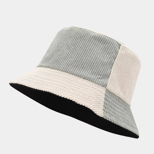 cream hat featuring color-block design and color-block