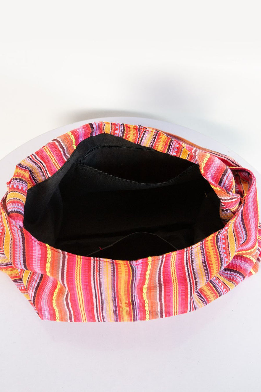 Tribal Weave Shoulder Bag in multicolor canvas with striped pattern and interior pockets.