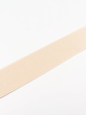 Cream elastic belt with textured weave and subtle ribbed detail