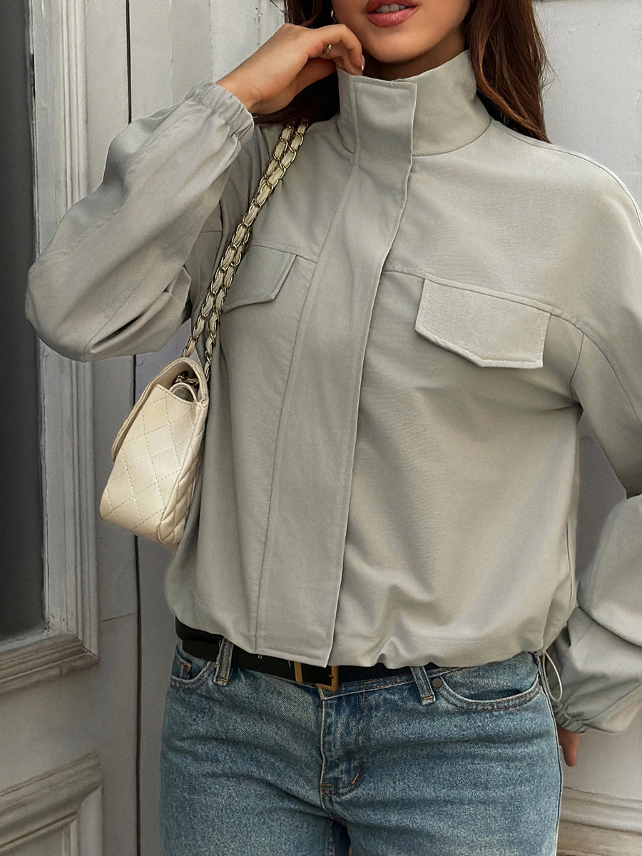 100% polyester Care instructions: Machine wash cold windbreaker in sage green with relaxed silhouette