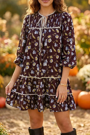 dark brown shift dress with floral and v-neck