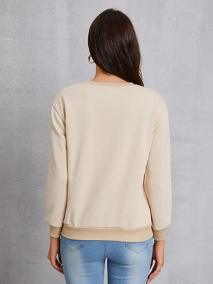 Khaki sweatshirt with crew neck and ribbed cuffs and hem.